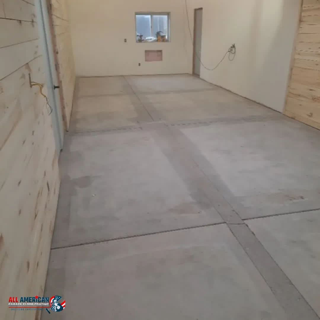 Bare concrete garage floor before polyurea coating
